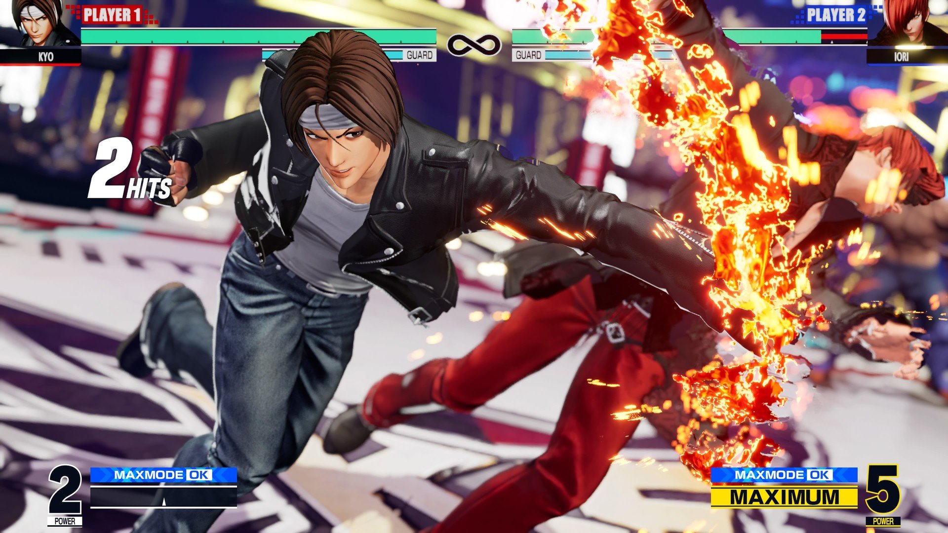 Kyo memukul Iori dengan jurus api