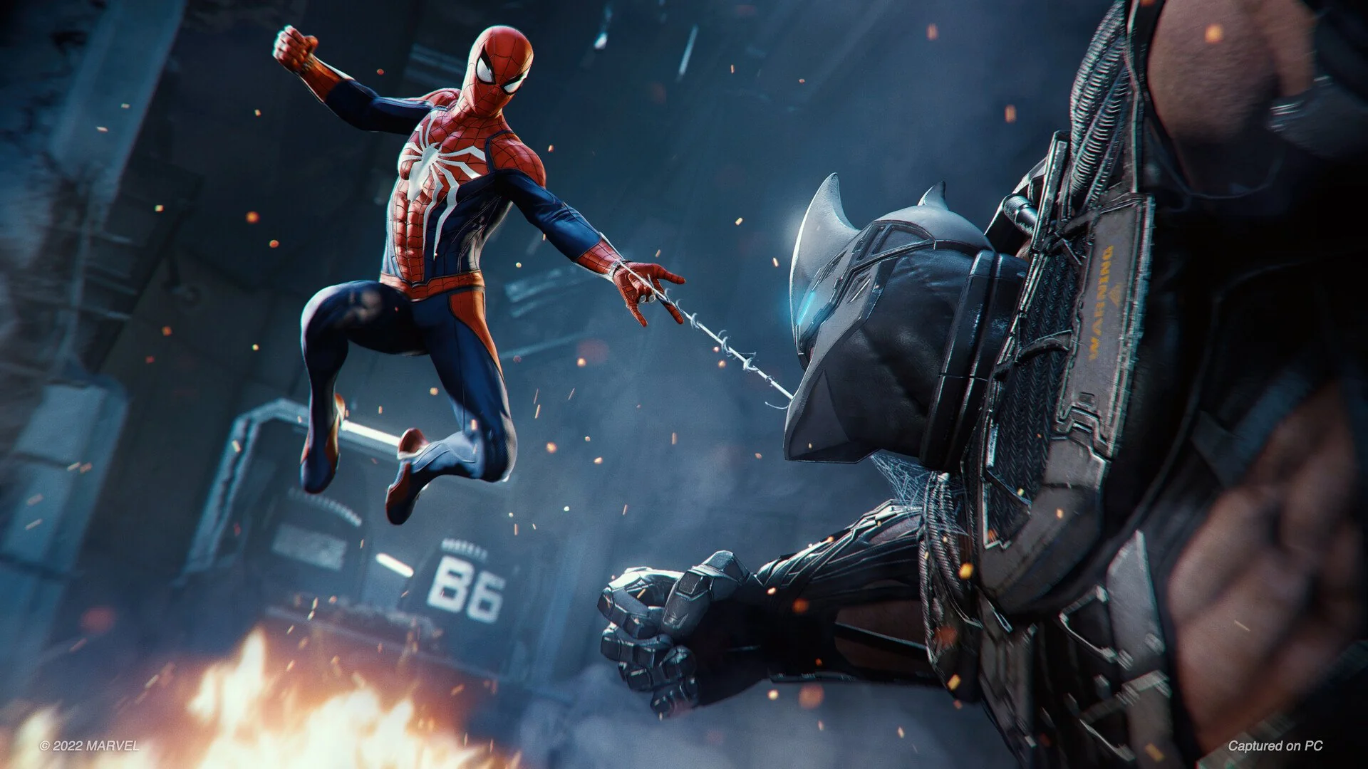 Spider-Man melakukan web shoot ke arah Rhino